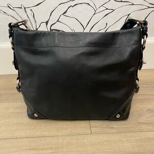 Coach Black Pebbled Leather Carly Shoulder
Hobo Bag